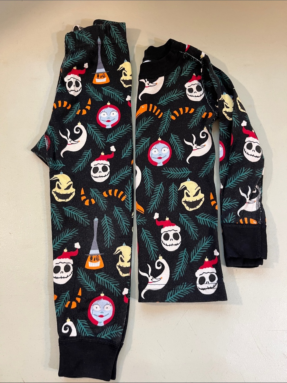 Hanna Andersson Black Halloween Character Pajama Set with Green Pine Motifs